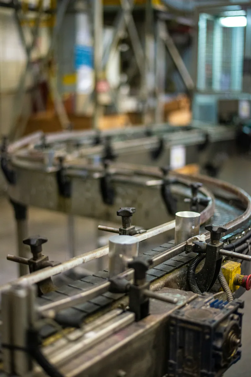 Close view of industrial production-line conveyor machinery