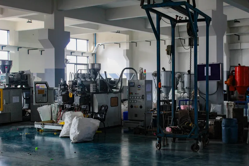 Plastic manufacturing factory with injection moulding machinery